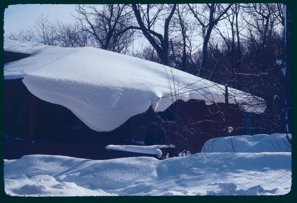 Snow draped off the office 1977